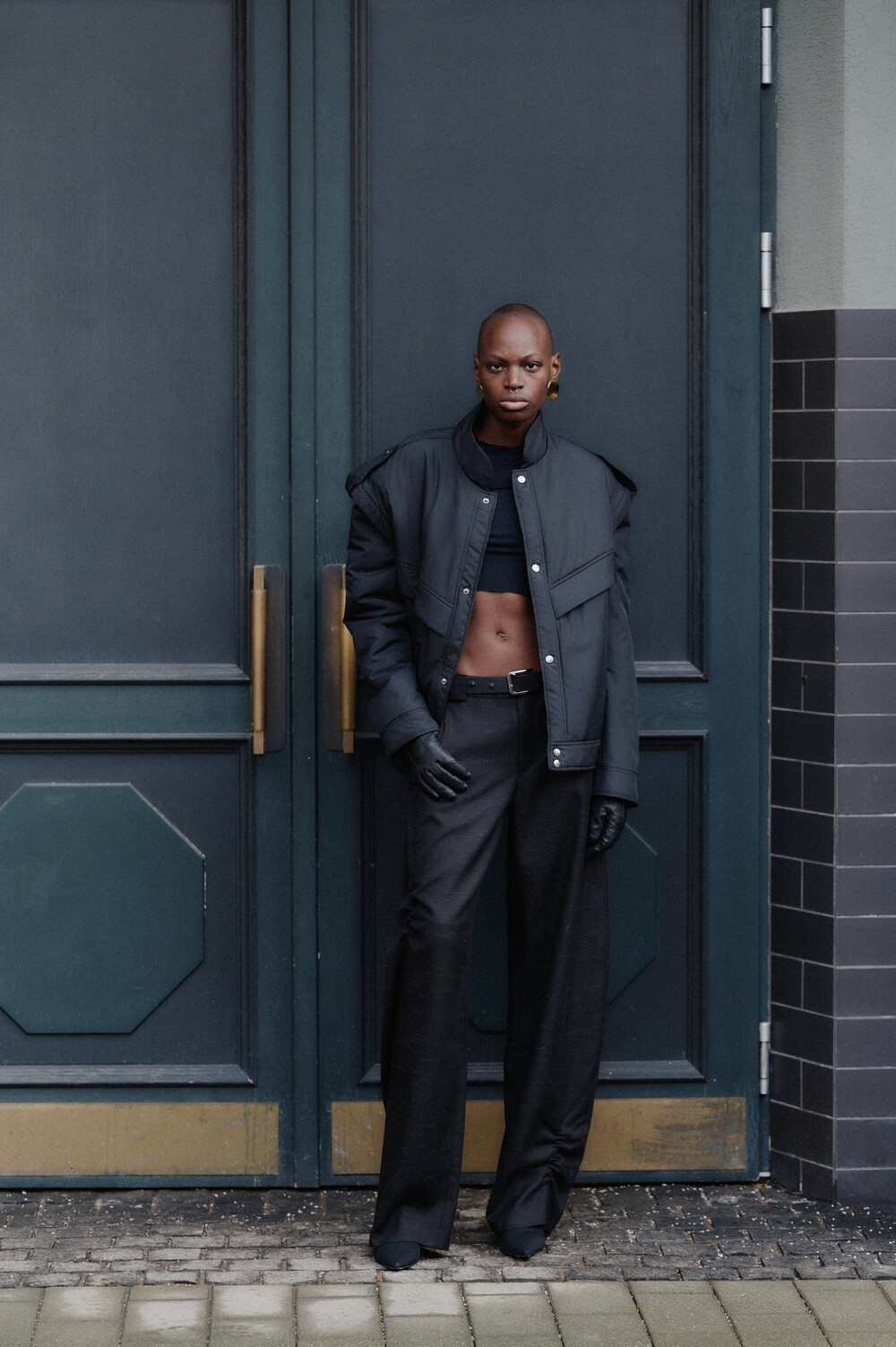 Black trousers with pintucks