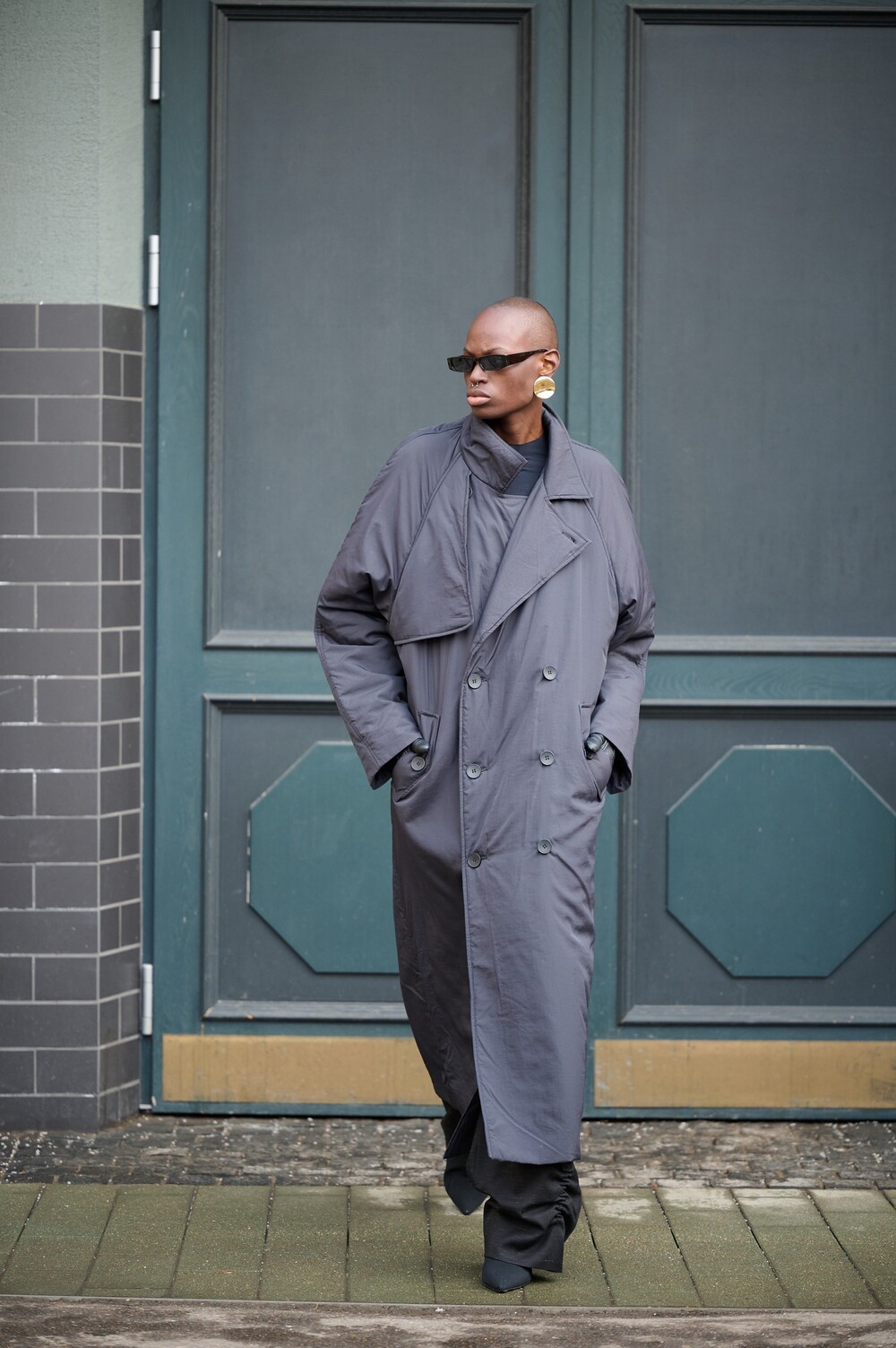 Insulated coat made of raincoat fabric